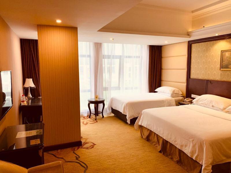 Vienna Hotel Shanghai Happy Valley Songjiang Extérieur photo